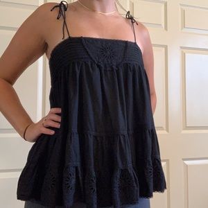 Levis flowy tank top with flower details.